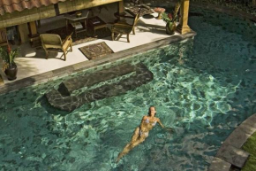 Villa Oost Indies fully staffed luxury villa, walk to the beach Experience true Balinese style with all modern luxuries